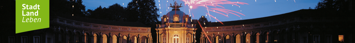 Stadt Land Leben -Banner mit beleuchteter Erimitage im Hintergrund