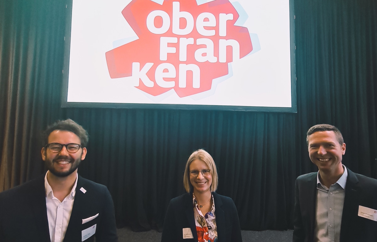 Andreas Zippel (Zweiter Bürgermeister der Stadt Bayreuth), Nicole Kaiser (Kanzlerin der Universität Bayreuth) und Florian Wiedemann (Landrat des Landkreises Bayreuth).