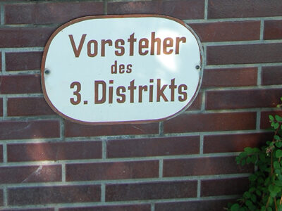 Schild eines Distriktsvorstehers