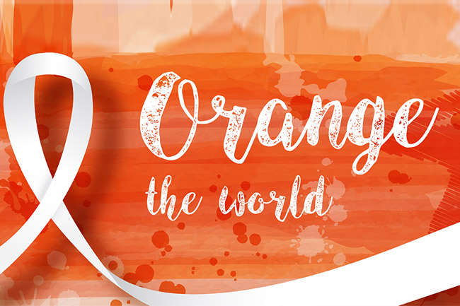 Schriftzug Orange the World auf orangenem Hintergrund