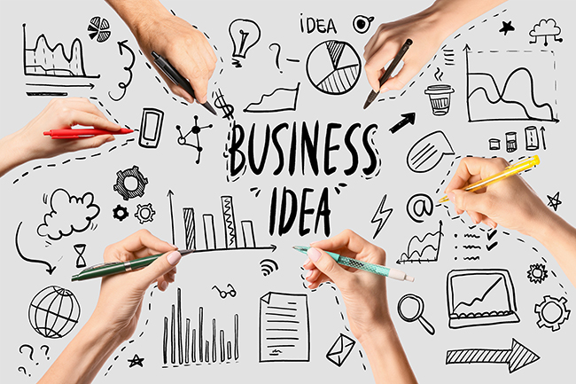 In der Mitte steht Business Idea und Hände malen rund um das Wort